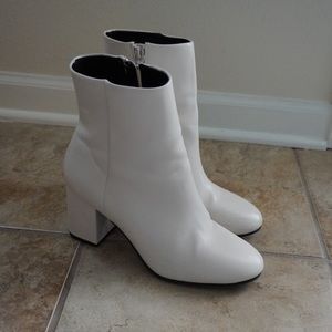 White heeled boots